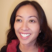 Rachel Webb Smiling woman with long dark hair